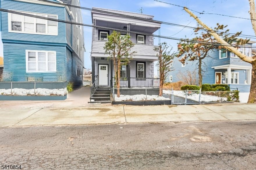 Cozy 2 family home on a generous 50x100' lot with oversized detached 2 car garage. Each unit feels like home with 2 bedrooms, stylish kitchen and warm LR. Updated with Modern, stylish touches and Equipped Kitchens! The large basement provides plenty of light and could be easily finished into a recreation room, office or gym.  Wide Driveway with plenty of parking and yard space. Home offers classic charm and is ideal for an owner occupant whilre renting the other for reduced expense!