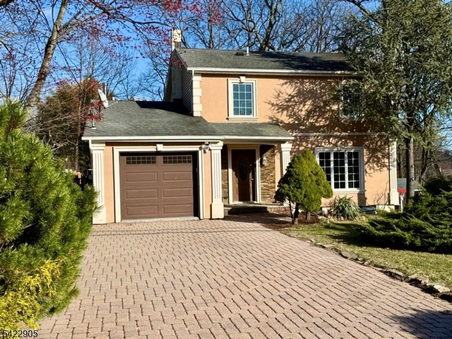 Let us introduce you to more than just a custom home - a lifestyle. The moment you enter the White Meadow Lake community, you'll be swept off your feet. On offer you'll find three beaches and two lifeguarded pools (May - September), surrounded by playgrounds, picnic areas, and, at the main beach, a lakeside restaurant! A community clubhouse, boasting a gorgeous terrace, which hosts year round events - like New Year's Eve or Valentine's Day parties, complete with a DJ! And then there are the tennis courts, sports fields, a street hockey rink, and a wide range of recreational amenities. The community is known for its beautifully maintained grounds and vibrant atmosphere. Walk right into this meticulously maintained, elegant 2-story colonial! Showcasing refined craftsmanship throughout, featuring Brazilian cherry hardwood floors on the upper level, oak flooring on the main level, and a striking oak staircase. The kitchen is appointed with granite countertops, KitchenAid appliances, and travertine flooring with intricate mosaic details. Bathrooms with travertine and ceramic tile, shower and bathtub.