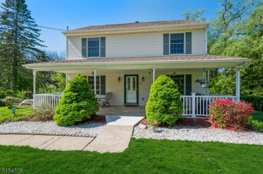 Modern living, country charm, excellent value! Spacious and sun-filled Colonial set on a manicured half-acre lot on a quiet street in this Morris County community. Just 40 miles from Midtown, this home is near all the natural pleasures of the area including 16 miles of trails connecting five parks, farmer's markets, a lake & the Randolph Park Beach. Highlights include a charming front porch, a full finished walkout basement, a patio w/a pergola, generator hookup & a storage shed in the oversized private back yard with plenty of room to expand. The interior of this move-in ready home features a flexible, open floor plan w/hardwood floors throughout, crown molding, ceiling fans w/light & bright rooms. From the welcoming front porch, step inside to a bright living room & a formal dining room. The kitchen is appointed with beautiful cream colored cabinetry, granite counters, tile backsplash, & SS appliances. The adjacent breakfast area is flooded with natural light and offers access to the patio. Enjoy warm weather cooking, dining, and relaxing on the patio as you admire the deep back lawn surrounded by mature trees. This level also includes a bedroom and a full bathroom.The second floor consists of a large primary bedroom with a vaulted ceiling & huge walk-in closet, and convenient direct access to the full hallway bathroom, a third bedroom & laundry room. A spacious recreation room in the walkout finished basement is perfect for a home gym, media center, office, or playroom.