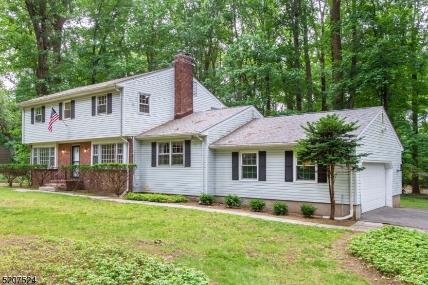 Welcome to this move-in ready, nicely updated center hall colonial on almost an acre of wooded land in the beautiful and quiet neighborhood of Powder Mill Estates. The first floor offers a large and bright living room and a spacious updated eat-in-kitchen with new granite counters, clean kitchen cabinets, and new stainless refrigerator, dishwasher, stove and vent. It features a cozy family room and fully renovated powder room with new washer/dryer. New tile, vinyl, and refinished oak floor throughout. The living room and family room lead outdoors where you can relax on the stone patio in a peaceful setting. The second floor offers a primary bedroom suite with an updated bathroom and a large closet. 3 additional spacious bedrooms with oak flooring and generous closets. A full, updated bath completes this floor. The partially finished basement is perfect for a rec room and there's a bonus workshop. Cool and shady in summer and bright and sunny in winter, this home is in a great location, convenient to Routes 10, 287 and 80, shopping, parks, NJ Transit with direct service to NYC, and highly rated schools. Tenant pays first $100 for each repair, must obtain tenant's insurance. NTN application with strong credit, income verification required.