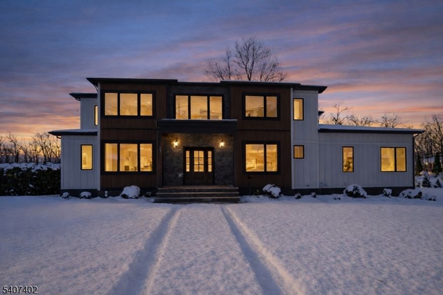 Set on an expansive lot of more than half an acre in the prestigious Riker Hill section, this custom-built NEW construction home is a masterpiece of timeless elegance and contemporary design. This 6-bedroom, 5.5-bath colonial offers an exceptional blend of luxury, comfort, and functionality.A grand entryway leads to an open-concept floor plan, thoughtfully designed to accommodate both refined entertaining and everyday living. The first floor features a well-appointed in-law suite, formal living room, spacious family room, and a sophisticated dining area. At the heart of the home, the gourmet kitchen showcases premium stainless steel appliances, an 8-foot center island, and sleek quartz countertops, making it a chef's dream.The second level is home to four generously sized bedrooms, including a sumptuous primary suite with a private lounge, offering a tranquil retreat. A dedicated laundry room enhances convenience on this floor. The fully finished basement  provides an abundance of additional living space. It includes a home gym, recreation room, lounge, private bedroom, and full bath, creating the ultimate setting for relaxation and entertainment.This exquisite residence offers an unparalleled lifestyle in one of the towns most desirable locations, perfectly balancing sophistication, comfort, and modern convenience.10 year builder warranty included