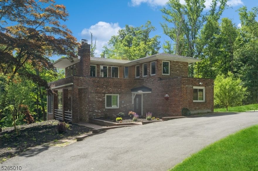 Remarks: A stunning private property set on 5.73 Acres including your own lake! A unique property for the most discerning owner. There's a patio surrounded with the lush park-like acreage. The open floor plan features four bedrooms and two baths. The brand-new kitchen includes quartz countertops and stainless-steel appliances. Keyfeatures include new high efficiency heating and cooling system, newly remodeled bathrooms with tasteful finishes throughout! Only three miles from Morristown's finedining, shopping, and entertainment, but feels like a private oasis. Under 3.5 Miles from either Morris Plains or Morristown Train Station. ALSO LISTED FOR SALE GSMLS # 3896955.  If rented it will be removed from sale.