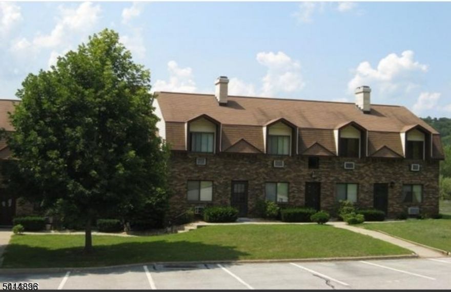 Welcome to this Quiet, Well-Maintained Neighborhood.  Completely remodeled GROUND FLOOR END UNIT. Tile, Hardwood & Carpet flooring.  Granite Countertops & Pantry in Kitchen along with access to Private Patio through sliding doors. Wall AC units and Ceiling Fans in Living Room and Bedroom. Safety Grab Bars in Bathroom. Stackable Washer/Dryer in Unit. Non-functional Fireplace with Mantel and space for Wall TV above.  Additional Storage Cage in Community Basement area provided.  Assigned Parking Space Provided right outside in front of unit. NO STEPS to deal with. Lovely Condo Unit. NO Smoking and NO Pets. Owner is a licensed Realtor.