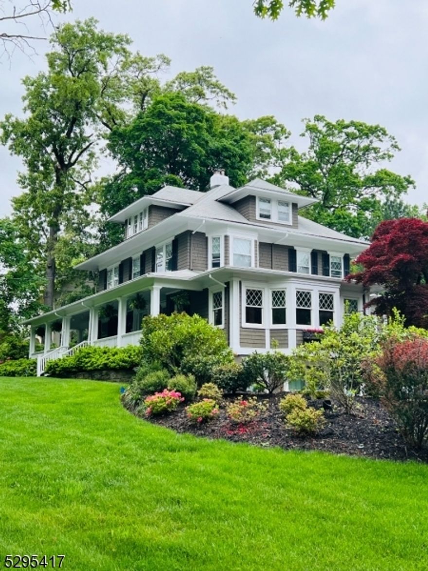 Offering a unique blend of charm, space and convenience in a prime location on the northside of Summit, this unrivaled residence has it all. Nestled at the corner of Beechwood Road and Hawthorne Place, this impressive center-hall colonial boasts panoramic views of the delightful neighborhood from its charming and expansive front porch that invites leisurely afternoons and engaging conversations. Centrally located, the home affords quick and easy access to the town's amenities, train station, schools, restaurants and shopping. Upon entering, the high ceilings and spacious rooms immediately captivate. The first level includes a dining room, living room, well-appointed gourmet kitchen, breakfast room, and a large and welcoming family room boasting walls of windows. On the second floor, three bedrooms, two full baths and a laundry center are spacious and inviting with a luxurious primary suite that offers generous closets and a well-appointed bath. The third floor offers two additional bedrooms, another full bath and extra storage while the walkout lower level offers a large recreational area, media area and a flexible space suitable for use as an additional bedroom, office, gym or theater. Outside, a side patio is bordered by elegant mature landscaping, creating a perfect outdoor haven.  Unbeatable in every way, this is a home you definitely must see.