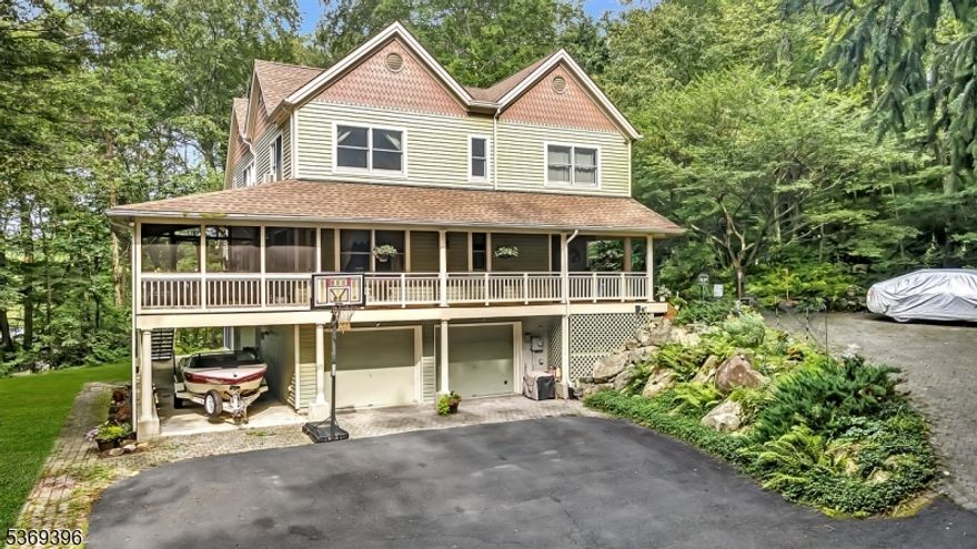 Custom contemporary/colonial home designed by architect N.S. Kim. The property sits on approximately 5.21 acres of secluded, wooded land contiguous to 82 acres of NJDEP protected Fish & Game Lands with paths leading to Ken Lockwood Gorge. The residence features cedar plank siding and oak hardwood flooring on the first and second floors. The basement offers engineered maple wood flooring. A bonus room with a wood stove is located in the finished basement, and the first floor showcases a see-through fireplace and a direct vent pellet stove. A basement freezer chest and secondary refrigerator are included. Outdoors, Cedar Plank siding, Mahogany wood-decking, an 8' x 8' creek-side deck with a fire pit which provides a serene retreat. The home was constructed in 1994 and has since upgraded the HVAC system and added a 30 yr. Timberline roof. Along the driveway is an 8' x 12' wood storage shed. The drive to the home is accessed via a private drive and culvert crossing the stream. Back on the Market. Unfortunately, the Purchaser had a house sale contingency, and the purchaser's house did not sell