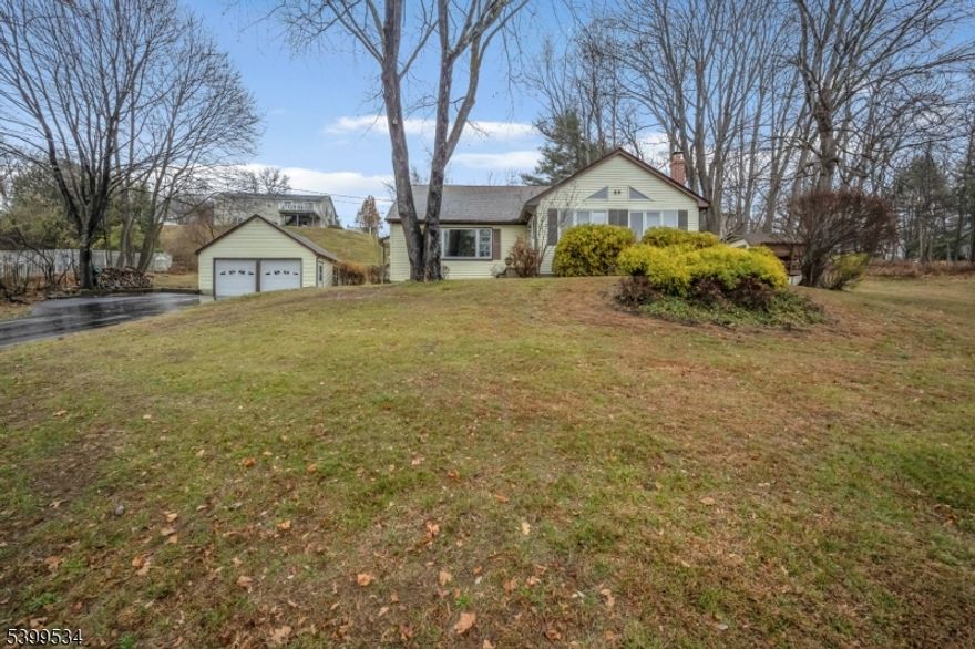This immaculately kept 4 bedroom, 2 full bath Cape is centrally located in Northern Hunterdon County's High Bridge. Hosting some of the amazing Blue Ribbon schools like North Hunterdon High School. This property has beautiful views, an oversized 2 car detached garage, a storage shed, a large patio w/ brick fire pit, a screened-in gazebo, & a large tiered deck! Head inside to the addition of the family room w/ vaulted ceilings, hardwood floors that spread throughout the entire home, a wood stove for the cold months & tons of windows looking out over the valley. From the family room you can make your way into the massive living room previously used as a dining room w/ a huge picture frame window to continue the beautiful views of the valley. Continue into the extremely large eat-in kitchen w/ designated dining area just waiting for you to add your personal touches & updates. Further down the hall you will have 2 large first floor bedrooms & a full bathroom. Upstairs there are 2 additional bedrooms & another full bathroom. This home does not lack storage as the full unfinished basement covers the span of the home & has a separate room that was previously used as a home gym. The home feels quaint as you pull up but once you are inside you will be shocked by the amount of open space it really provides & can allow your imagination to run wild as to what you can do to make it your own.Easy access to NYC train as well as beautiful hiking trails throughout the town & surrounding areas