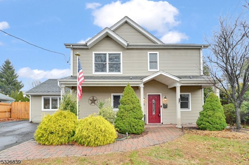 This 3-bedroom, 2.5-bath colonial on a spacious lot with a fenced backyard is a rare find and won't last long! The modern, open-concept eat-in kitchen features a breakfast bar, elegant cabinetry, and granite countertops. With ample cabinet storage and counter space, it opens seamlessly to the living room, where doors lead to the expansive fenced backyard perfect for entertaining! The main floor also boasts a formal dining room with custom moldings, a powder room, and a bedroom, offering versatile living options. Upstairs, the primary suite impresses with two custom closets and a luxurious bathroom featuring a jacuzzi tub and an oversized shower. The second floor also includes a generously sized second bedroom, a full bathroom, and a laundry room for added convenience. This home has just been professionally painted and showcases recessed molding and custom trim work throughout. Located within walking distance of Saddle River County Park, you'll enjoy access to a paved walking path, a playground, restrooms, fishing spots, and more! Plus, this property is just minutes from the Garden State Plaza Mall and offers easy access to major highways, including Routes 4, 17, 80, and the Garden State Parkway. With its prime location and thoughtful design, this home is an absolute must-see!