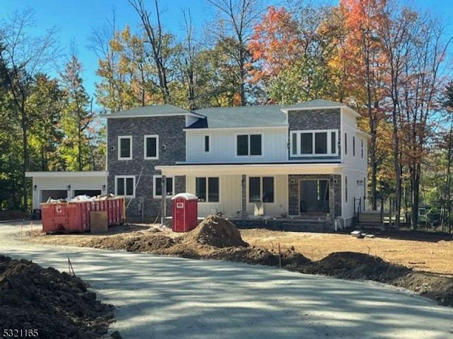 Custom home specifically designed and implemented for Buyers.  Possible walk-out lower level, potential pool site.