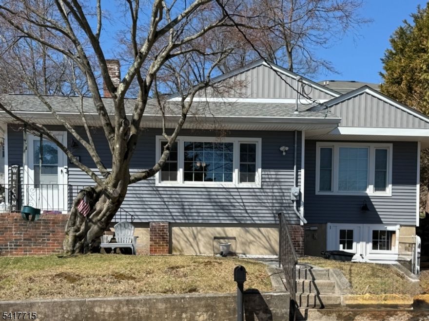 Move right into this beautifully maintained and thoughtfully updated home featuring a renovated kitchen and baths, Pella windows, French doors, newer roof and siding, and a generator hookup for added peace of mind.  Enjoy generously sized rooms and a fully finished basement -perfect for a recreation room, guest space, or home office. Step outside to a private deck and patio, ideal for entertaining or everyday relaxation.  Gas available in the street for future conversion. Convenient location close to shopping, dining, and major commuting routes.