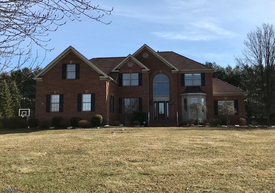 Turn the Key and Un-Pack! Impeccable brick front custom home located in the Fairways at Flanders features a grand 2-story foyer; custom moldings, wainscoting; sparkling wood and tile floors; open concept chef's kitchen with center island, stainless appliances, 42" cabinets; granite counters overlooks 2-story family room with skylights and fireplace; 20x12 conservatory; office/den; grand Master suite with tray ceiling, sitting room, 2 walk in closets with organizers and master bath with jetted tub; 3 generously-sized secondary bedrooms; front and rear staircases; recessed lights; sizable 1st floor laundry provides access to 3c garage.  Expansive paver patio overlooks nicely landscaped tree-lined, level yard. Whole house automatic generator. Less than 1.5 mi to Rt206, Shops, restaurants, Public Golf, Parks.