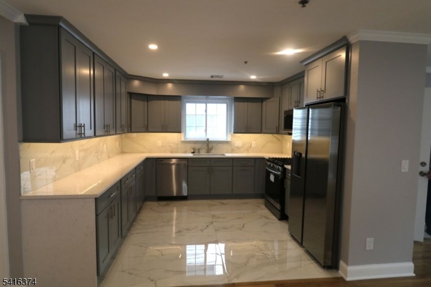 Beautifully renovated 3-bedroom, 2-bath apartment in the desirable Ironbound section of Newark. This spacious unit features modern finishes, an updated kitchen, and bright, comfortable living spaces. Parking is included for added convenience. Located close to restaurants, shopping, public transportation, and major highways, making commuting to NYC easy. Move-in ready and perfectly situated in one of Newark's most vibrant neighborhoods.