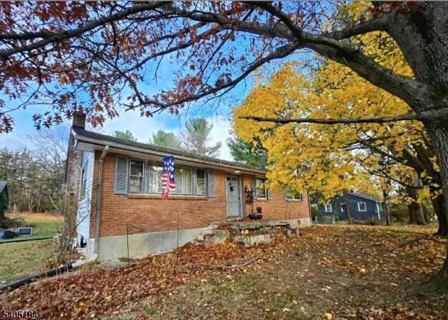 Great opportunity for investors or owner-occupants in Washington Borough. This 3-bedroom, 1-bath ranch features a full basement and detached garage, offering excellent potential for renovation, expansion, or customization. Set on an expansive 1.92-acre open lot, the home is tucked away on a private lane, providing exceptional privacy and a tranquil setting. The rear of the property borders the historic Morris Canal, adding distinctive character and natural appeal. An ideal offering for buyers seeking space, privacy, and long-term value.