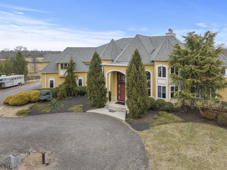 Introducing a highly sought-after one-of-a-kind Somerset masterpiece. Home epitomizes the ultimate in custom built homes, exquisite attention to details, and grand entertaining. Built in 2007 of the highest quality materials for $3M. Open floor plan and extra-large windows with abundance of light flowing through home. Light fixtures made of alabaster. High velocity multizone HVAC and radiant heating will cool rooms quickly or efficiently heat. The chef's kitchen features an extra-large granite island and custom cabinetry to truly inspire your chef's desires. The oversized Sub-Zero refrigerator and Bosch dishwasher have custom cabinetry to blend in with kitchen, and elite Dacor 6-burner range and appliances complete the package. Amazing views of the outdoors on 4 balconies overlooking equestrian farm and Spooky Brook golf course. Four fireplaces including one in home office on those days you work from home. Master Suite has indoor and outdoor living with balcony overlooking property and golf course, inviting fireplace, sitting room, and luxurious ensuite. Equestrian facilities has state of the art barn with radiant heating, four 12 x 12 stalls expandable to six, 14 foot aisle way, wash station ready, 100 bale loft storage, timed lights, stone dusted arenas, 2 run-ins, and 3 paddocks expandable to 5. Saddle up and trail ride in Colonial Park. Barn is income producing yielding as much as $800 per stall. Home is mind-blowing and will truly dazzle you! Delayed showing April 2.