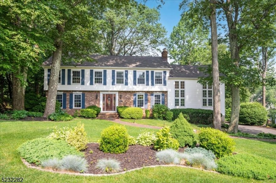 Classic Center Hall Colonial in a Peaceful and Private Setting! Centrally locate in the Ironia neighborhood of Randolph, near top-rated schools as well as shopping, dining, and multiple parks. This 4 bedroom, 3.5 bath home has great flow through the main level, starting with an inviting foyer and formal living and dining rooms. Next is a generous eat-in kitchen equipped with rich wood cabinetry, recessed lighting, stainless steel appliances and center island with additional seating, and an adjacent breakfast room boasting a gas fireplace and tranquil front yard vistas. The great room is prefect for grand entertaining, with a second gas fireplace, adjacent powder room and sliding glass doors out to a deck where you'll surely enjoy the serene surroundings. Upstairs is a sprawling primary bedroom suite with huge walk-in closet and spa-like bath with jetted tub and separate shower, with a bonus loft space overlooking the great room below. Three more bedrooms are serviced by a full hall bath, also with tub and shower. There's more living space on the lower level, with a spacious rec room, full bath with shower, and access to the attached 2-car garage, plus a utility room with more storage space. A relaxing oasis awaits you out back, where you'll enjoy summer cookouts on the deck overlooking a lush shady lawn with mature landscaping lined by trees.