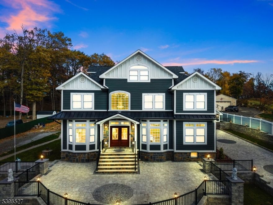 One-of-a-kind luxury construction on a dead-end street. Every detail of this high-end home has been thoughtfully designed & upgraded. A grand entry welcomes you to the entry foyer leading to a formal living rm, formal dining rm w/ fireplace & a gorgeous chef's kitchen w/ high-end appliances, custom cabinetry & dining area. The first floor is completed by a family rm w/ fireplace, an office, guest bedroom & 1.5 baths. Upstairs, a beautiful loft area opens to the primary suite-an indulgent retreat featuring a private balcony, 2 walk-in closets & a spa-like bathrm w/ soaking tub & separate shower. Four additional bedrooms, a laundry rm w/ double washer/dryer sets & a full hallway bath complete the second flr. The finished attic provides additional flex space for crafts, gym or studio. The fully finished basement is an entertainer's dream-complete w/ summer kitchen, exquisite bar, rec rm, full bath & second laundry area. Outside, enjoy resort-style living w/ an in-ground pool/hot tub, separate pool lounge/clubhouse w/ bar area, patio paver driveway/walkways, two-car garage w/ full bath & finished loft-perfect for studio space & professionally designed outdoor lighting for the ultimate ambience. Smart home technology, offering Wi-Fi control of security cameras, door locks, doorbell, surround sound & heating/cooling system. A sprinkler system & meticulously landscaped grounds complete this truly exceptional home. A rare opportunity to own a show-stopping masterpiece!