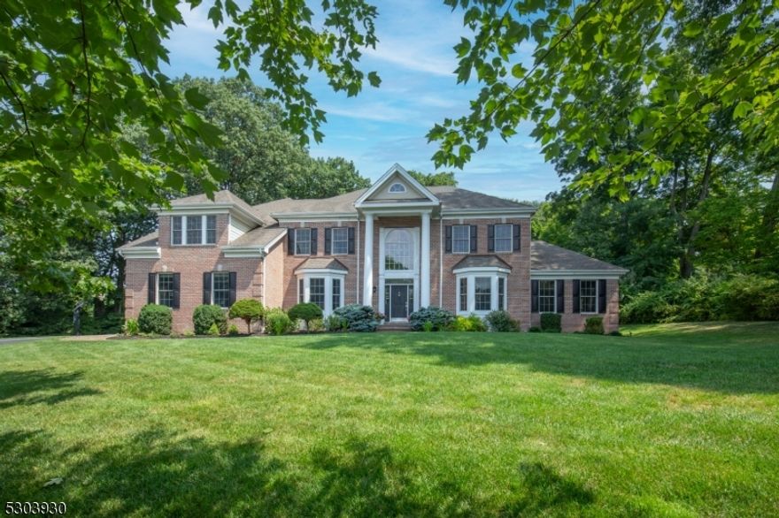 Rare opportunity to live in Governor Estates, Mendham's highly sought after development. 4 Bedroom, 5300 sq ft Colonial located on East Side of town! Many upgrades- this stunning brick front & hardy plank custom home features a dramatic two-story Foyer, LR w two-sided gas fireplace opening to sunlit Conservatory, Formal DR w wet bar and 2 story FR w gas fireplace & French doors to home office. Gourmet Eat-In Kitchen w Sunroom area features granite, SS double wall ovens, two dishwashers, Sub Zero fridge, 10' center island and custom cabinetry throughout. Four bedrooms on 2nd level include oversized Primary Suite w FP, office, sitting area, two walk-in closets & fab en-suite bath. The finished LL offers an additional 2300 sq ft of living space! This space offers 12' wet bar with granite, stainless fridge, bar lighting & stools. Home gym, play & rec areas, bonus room, full bath, and ample closets & storage. Laundry room w custom cabinets, sink, coat closet & direct entry into the 3 car garage w Tesla charging station. Second laundry area is conveniently located on the 2nd floor w full size GE washer/dryer & adjacent linen closet. Three Gas Fireplaces, Anderson windows & hardwood flooring throughout. 1.2 acres located at the end of private cul-de-sac w sprinklers, paver walkways & patio. Energy Star rated utilities. Walk to downtown. Blue Ribbon Schools. Easily convert the 1st floor Office or Conservatory into a First Floor Bedroom En-Suite!! Fab Entertaining Home. A MUST SEE!!