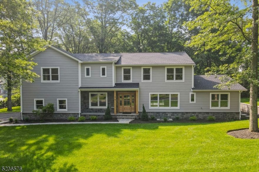 NEW construction/renovation at NEW PRICE. BEST DEAL in town. Colonial home nestled on a large lot in the desirable Rolling Hill Section. Walk to award-winning schools, w/ easy access to downtown and train lines. Complete remodel inside and out. Large addition on the 1st, 2nd, and bsmt levels. 5" white oak floors and custom moldings throughout. 1st floor features a high-end chef's kitchen w/ Thermador appliances and custom 2" quartz countertops w/ waterfall design, breakfast rm, dining rm, and open family rm off of the kitchen. Custom marble fireplace surround in Family rm. Carrier 2 zone HVAC system. The 1st floor also offers a mud room with thoughtful details, a half bath, and an additional bedroom/office en suite w/ a full bathroom. The 2nd floor has 5 bedrooms, 3 full baths, and a laundry room. Lighting and bathroom fixtures reflect today's discerning buyer. The primary bedroom features '10 ship lap ceiling, double walk-in closets, and a primary bathroom. New square footage was thoughtfully added to the basement, featuring '9 ceiling heights in the main rm, w/ an additional bedroom (or gym) and full bath. The basement is approximately 1150 sf w/ plenty of storage. Enjoy the front-covered portico or relax out back in your flat private backyard, which cozies up to a quiet cul de sac. Builder included a custom blue stone patio w/ gas BBQ and a fire pit for the best of outdoor living. Quality craftsmanship and products featuring Hardi-Board, Azek trim, and Anderson 400 windows