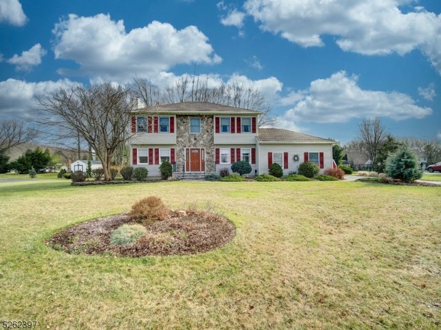Pride of ownership abounds here as this home has been meticulously maintained by its original owners and it's located in a desirable Succasunna neighborhood. It has attractive curb appeal giving a great first impression of this beautifully appointed home. This gem features 4 bedrooms & 2.5 baths, nicely updated kitchen, updated baths, wood floors, gorgeous wood burning stone fireplace and huge laundry room with access to deck. Living room and family room have been blended for more spacious look yet still provides two distinct functions. Formal dining room is perfect for your special occasions. Sliding doors off the kitchen lead to an entertaining sized deck overlooking the large, flat, tree lined yard. There are two sheds and a second deck in the backyard. Newer bay window in the living room. Primary bedroom will delight. It features a walk in closet and updated full bath with spa like tub/shower.  Three additional bedrooms and a full bath complete the second level. Full basement is ready for finishing. Other features include some crown molding, two car garage & PUBLIC UTILITIES!   Conveniently located near major roadways, Horseshoe Lake Park, shopping & restaurants. ONE YEAR HOME WARRANTY INCLUDED.  DON'T MISS THIS ONE!