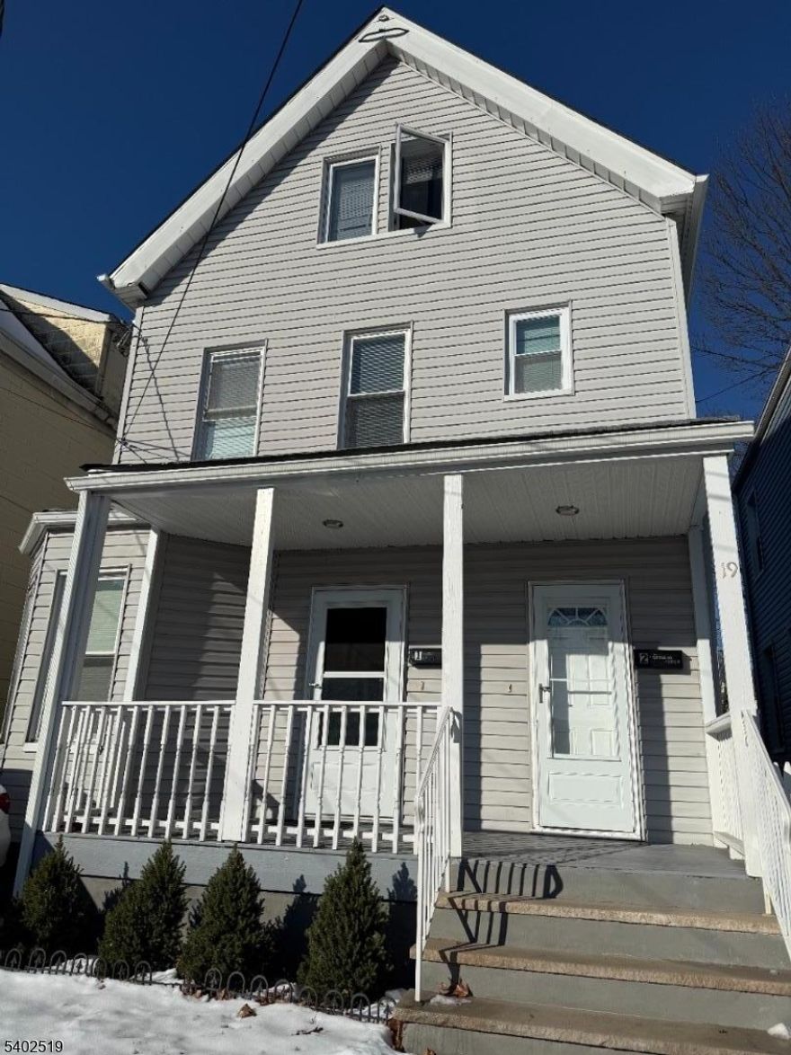 Located on a quiet one-way street, this newly renovated first-floor apartment offers a perfect blend of modern luxury and suburban convenience. The interior features a newly renovated kitchen finished with granite countertops, a full bathroom, a dedicated mudroom, and two sun-drenched bedrooms and living room. Modern essentials include central air conditioning and a full unfinished basement providing ample storage and laundry space. Outside, enjoy a private porch and patio overlooking a large, fully fenced backyard an ideal retreat for outdoor living.The location is unparalleled for all. You are just two blocks from the highly-rated Hazel Ave. Elementary and a half-mile from Seton Hall Prep, with rapid access to the Highland Ave. train station, Route 280, and the Garden State Parkway. This home base puts the best of Essex County at your doorstep: enjoy easy weekend trips to South Mountain Reservation and Turtle Back Zoo, or explore the premier dining, shopping, and culture of nearby Montclair, SOMA, and Bloomfield. Additionally, you'll benefit from local West Orange conveniences, including nearby shopping centers and the highly anticipated new Target and Trader Joe's. This residence offers a high-quality lifestyle in a peaceful, well-connected neighborhood.