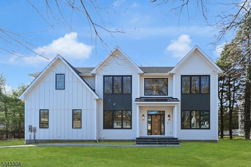 Welcome to this stunning, NEW CONSTRUCTION 6-bed, 6.5-bath Colonial is situated on a flat 0.34-acre lot. The first floor features an elegant foyer, a formal dining room, and a spacious living room with a bay window and a gas fireplace. The open-concept design connects the family room, breakfast nook, and chef's kitchen with stainless steel appliances, a large center island, and walk-in and butler's pantries. Sliding doors lead to a deck overlooking the expansive backyard, perfect for gatherings. A versatile main-level bedroom includes a private en-suite bath and walk-in closet, ideal for guests. This floor also has a stylish powder room, dedicated study, and access to the attached 2-car garage. Upstairs are four generously sized bedrooms with en-suite baths, including a luxurious primary suite with dual walk-in closets and a spa-like bath. A convenient laundry room completes this level. The fully finished basement offers additional living space with a recreation room, media room, extra bedroom, and full bath great for movie nights or as a guest suite. High-end finishes like decorative trim and designer light fixtures enhance the modern appeal. The home BOAsts beautiful curb appeal and is located just over a mile from shops, restaurants, and major roads. Enjoy walking distance to the library, playing fields, town pool & recreation center. Benefit from Florham Park's highly rated schools and low taxes, all backed by a 10-Year Builder Warranty.