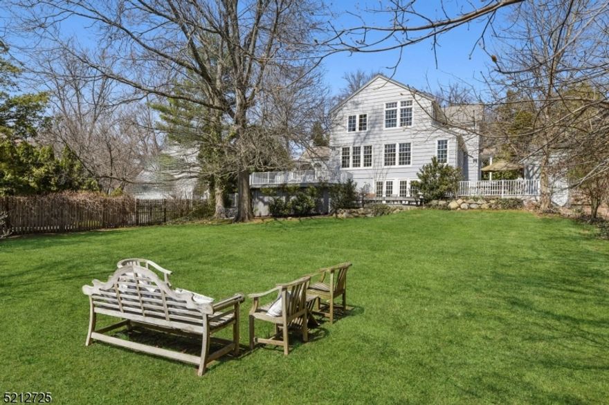 MODERN & AIRY COLONIAL * AMAZING RIDGE TERRACE LOCATION * A rare opportunity to acquire your dream home that has cosmopolitan appeal, an easy-flowing floor plan & has been completely renovated on every level. Enter front-to-back foyer where a formal DR & elegant LR with fireplace greet you. Adjoining the LR, an expansive, open-concept family room with gorgeous tree-top views, effortlessly flows to the sleek gourmet kitchen, breakfast area, PR, mudroom, 2-car garage, bluestone dining patio & amazing, multi-tiered decks. The state-of-the-art kitchen has a bar area, top SS appliances (Viking/Miele), center island with quartz counters & bar seating -- absolutely perfect for today's living! Upstairs, 4BRs include the primary suite: a luxurious sunlit room w/ a wall of windows, large WIC & gorgeous marble bath with double vanity & glass shower. LL: office, PR, laundry & rec rm or 5th BR suite w/ 2nd kitchen. Step out French doors to the lower deck & overlook the professionally landscaped property with flowering trees, large lawn (room for pool) & outstanding outdoor entertainment space. MORE: new CAC (AirGroup), new front roof, upgraded electric, freshly painted (interior/exterior), 1st floor refinished, high-end light fixtures throughout. SAFELY WALK TO EVERYTHING: NYC trains, Short Hills Village, C.H. Arboretum, downtown Millburn, Glenwood Elementary & all top-rated Millburn schools. A wonderful retreat with fantastic location & modern amenities -- this custom home will not last!