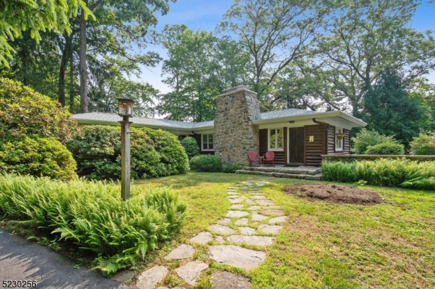 RANCH STYLE LOG CABIN IS RICH IN ADIRONDACK CHARACTER.  This 3 bedroom, 2 full bath home is situated on a DOUBLE LOT boasting ABUNDANT PRIVACY in desirable Randolph.The property and yard is peaceful and tranquil.  Its unique features are wide plank pine grooved & pegged flooring, a gorgeous stone woodburning fireplace and a beautiful updated kitchen with stainless steel appliances.  Three nice sized bedrooms (one currently used as an office). All bedrooms have built in dressers in the closets. The full bath is a generous size and updated. The walk out lower level includes a very spacious guest room, full bathroom with stall shower, den/family room and large laundry/work room, plus storage.  This level has an entrance to back patio and carport . The roof approximately 10 years old. Enter driveway via High Avenue and exit via Davis. Super close to all shopping, parks, restaurants and commuter highways.