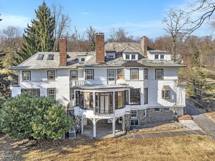 Restoration Project Alert: Welcome to this once majestic colonial, nestled on prestigious Upper Mountain Avenue, one of NJ's most sought-after neighborhoods. Set on over an acre of mature trees, this property offers endless possibilities for customization. Featuring a grandfathered tennis court, a three-car garage, this estate is perfect for those seeking space, privacy, and potential. Blending classic architectural details this home boasts fine dentil moldings, hardwood floors, five fireplaces, and intricate panel millwork. The charm and character of the property are evident throughout, awaiting a buyer with vision to restore it to its full glory. Relax in the four-season sunroom, offering serene views of the tranquil backyard, a peaceful escape perfect for unwinding. The location is ideal, with easy access to all modes of public transportation, including Midtown Direct train, Mountainside Park, Upper Montclair Village and Montclair University. Upper Montclair with its shops and restaurants, is just minutes away. This property is being sold "as-is," with current renovations left totally incomplete. This opportunity won't last long!