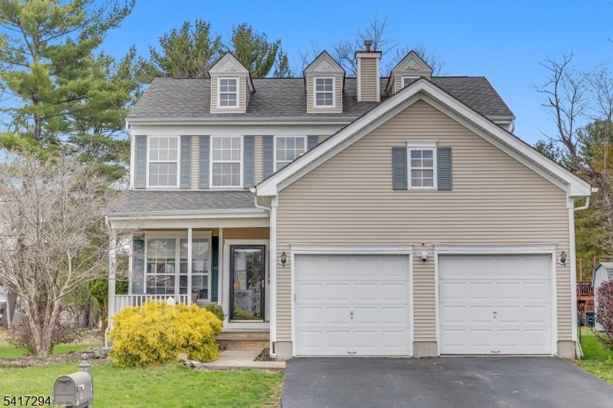 Updated colonial in Brook Hollow, a desirable community in Hackettstown with miles of sidewalks; convenient to Rts. 80 and 46, as well as seconds to quaint downtown Hackettstown shopping, theater, dining, Centenary University, NJ Transit Train and more! Two story foyer greets you, leading to open floor plan with formal living and dining rooms, eat-in kitchen with granite counter tops and stainless appliances, breakfast bar and open to spacious family room with wood burning fireplace. The second floor offers 3 spacious bedrooms, main bath and primary suite with walk-in closet and full bath. Fully finished basement includes 26x22 rec room and 12x12 exercise room, as well as storage. Other highlights include newer deck with vinyl railings; 2 car attached garage, public utilities, window blinds, furnace, coil, A/C new in 2024; newer LVP flooring; new gas stove and more! Basement electric heat. $5000 flooring credit being offered. Brand New Roof to be installed prior to closing.  Dining Room and Family Room have been flipped, FYI. Garage fridge remains with sale.