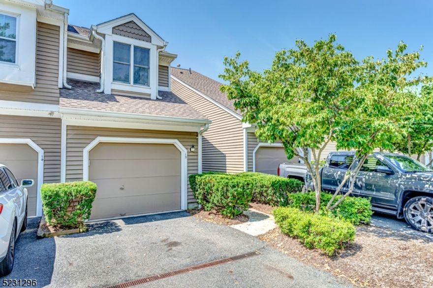 Welcome to this beautifully appointed townhome in the premier Stone Edge neighborhood in Bedminster Hills. This turn-key unit boasts an open yet defined floor plan spanning nearly 1500 square feet over three levels. The heart of this home lies in the beautifully renovated eat-in kitchen, boasting sleek stainless steel appliances, custom cabinetry, and stunning granite countertops. Recessed lighting adds a touch of sophistication, creating a well-lit environment for culinary pursuits. The kitchen seamlessly flows into the open living and dining areas, providing a perfect space for entertaining. Step out onto the private deck, an ideal retreat to unwind and enjoy the views. Retreat to the second floor where the sleeping quarters await. The primary suite offers a distinctive touch with its designer-inspired feature wall, a custom walk-in closet and luxurious bath with soaking tub and tile shower stall.  A second spacious ensuite bedroom, linen closet and laundry complete this level. On the lower level you will find the family room complete with a cozy gas fireplace and a full bathroom, further enhancing the convenience of the home. Sliding glass doors lead to the patio and level backyard, which seamlessly extends the living space outdoors and provides a perfect spot for relaxation and enjoyment. With an exclusive neighborhood pool & tennis courts, sought-after Stone Edge is conveniently located with easy access to I-78 & 287.