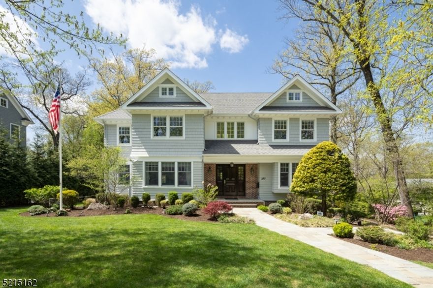 This Summit Northside 5 bedroom, 4.1 bath custom 2008 center hall colonial is sure to impress with a contemporary floor plan. The home sits proudly on nearly .4 flat acres and commands lots of natural light. The first floor has large rooms; living room and dining room flanking the foyer and an office tucked on the side. The back of the home has a butlers pantry and kitchen with a center island that opens to a breakfast room and family room. Right off the kitchen you look over an expansive blue stone patio with built in kitchen, sitting area and flat yard perfect for play. The second floor has 4 bedrooms and 3 full baths. There is a hall bath that services one bedroom, a jack and jill setup for the front two bedrooms and a large en suite master bedroom. There is also a finished bonus room on the 3rd floor. The home is complete with a basement that has a mudroom, rec room, gym, bedroom with full bath and a 3 car garage. You are in close proximity to Summit Downtown and all that it has to offer. The architect for this home is Rosen, Kelly Conway.  We look forward to showing you this masterpiece.