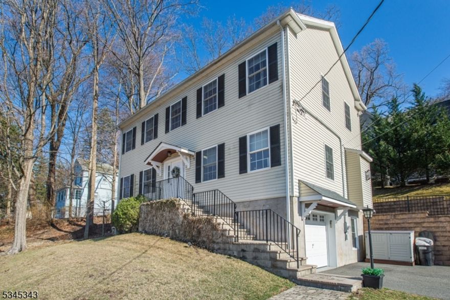 Don't miss out on this opportunity! This tastefully updated and well maintained 5 bedroom, 3.5 bath Colonial is walking distance to the Morristown Green and Train Station. Updated kitchen with newer cabinets, granite countertops, large center island, pantry, SS appliances, tile backsplash and HW floor. Main floor makes entertaining easy with a formal dining room, family room, living room w/ gas fireplace and sliders leading to deck with a pergola roof & fenced in backyard. Home also complete with finished basement w/ full bath & bedroom, 1 car garage, crown moldings, stackable W/D upstairs, 2 zones central air, 3 zones heating, large primary bedroom w/ WIC closest & full bath.