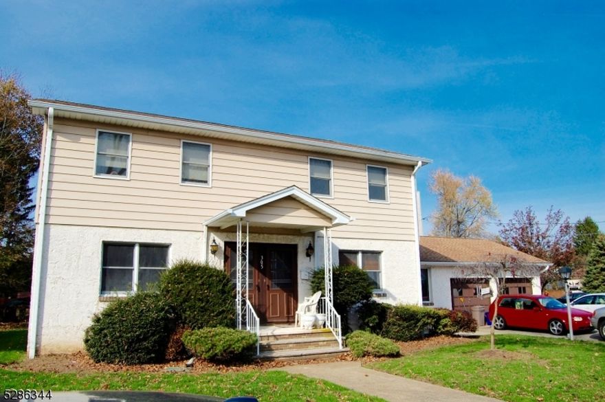 FIRST TIME AVAILABLE! Built-to-last multi-family, conveniently located in the Boonton Flats.  Two large units, with the downstairs showcasing an additional living room that could be converted into another bedroom. Full basement and two car garage with additional tenant parking.  This home sits on a large level corner lot, with a partially fenced-in rear yard.  Separate utilities. Don't miss your opportunity to live in one unit and offset your mortgage with this wonderful investment property.