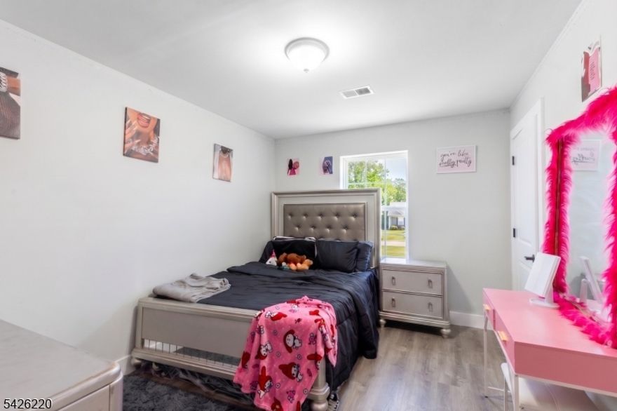Welcome to beautiful three-family home. This turnkey property offers modern construction, strong income potential, and exceptional versatility for both investors and owner-occupants.Each unit features a spacious and well-designed layout with 3 bedrooms and 2 full bathrooms, while the first-floor unit stands out with 3 full bathrooms it's ideal for added convenience and flexibility. All units showcase updated kitchens with contemporary finishes, stainless steel appliances, and open-concept living and dining areas filled with natural light.The home has been completely upgraded with brand-new, separate heating and central air conditioning systems for each unit, ensuring efficiency and individual control. Additional highlights include modern flooring, updated bathrooms, and thoughtfully designed interiors throughout.The fully finished basement offers incredible bonus space, perfect for recreation, storage, or potential additional living flexibility.Exterior features include a large private driveway with ample off-street parking, a rare and valuable amenity for a multi-family property. The property also boasts updated siding, newer roofing, and a clean, well-maintained appearance.Whether you're looking to live in one unit while generating rental income or expand your investment portfolio, this property checks all the boxes with its strong layout, and desirable features.Don?t miss this exceptional opportunity!