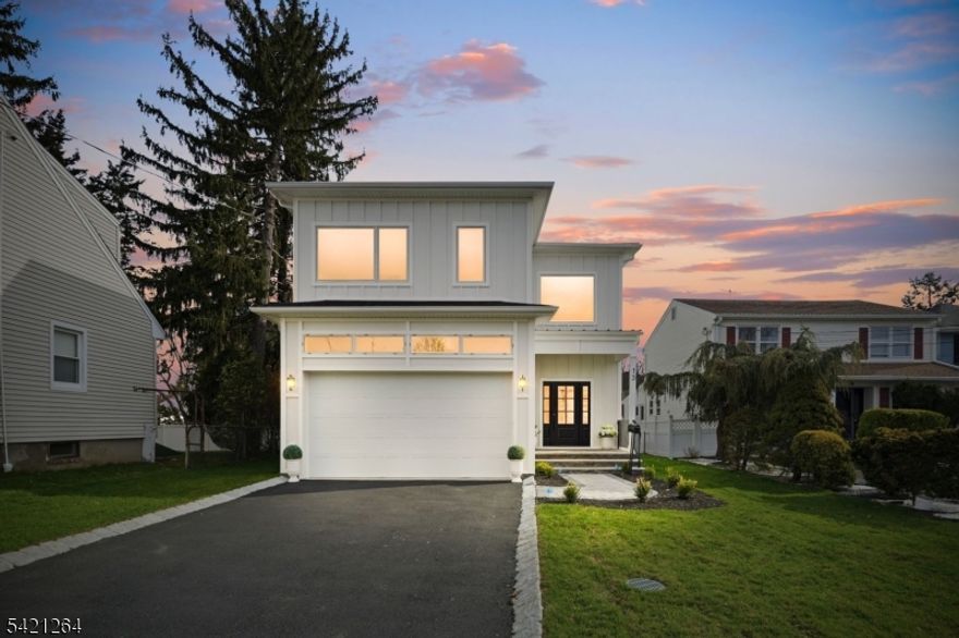 Brand New Construction! Experience luxury living in this exceptional 4,500 +/- SF 6-bedroom, 5.5-bath home nestled in the desirable Riker Hill section of Livingston. The 1st floor welcomes you with a grand foyer that sets an impressive tone from the moment you enter. The bright, open layout is centered around a custom-designed kitchen featuring premium appliances, abundant storage, and a convenient mudroom. An elegant dining room offers a refined setting for gatherings, while a stylish powder room adds everyday convenience. A private en-suite bedroom on the main level enhances comfort for guests. Direct access to the 2-car garage completes the thoughtfully designed first floor.The second level offers four well-appointed bedrooms, including an elegant primary suite with a spa-inspired bathroom, along with three additional bathrooms and a dedicated laundry room.The lower level expands your living space with a full bedroom and bathroom, along with a versatile recreation or office area. Outside, a thoughtfully designed backyard oasis provides the perfect setting for relaxation or entertaining.Defined by quality craftsmanship, thoughtful design, and an ideal location, this home delivers an elevated lifestyle in one of Livingston's most sought-after neighborhoods.This property includes a 10 year warranty.