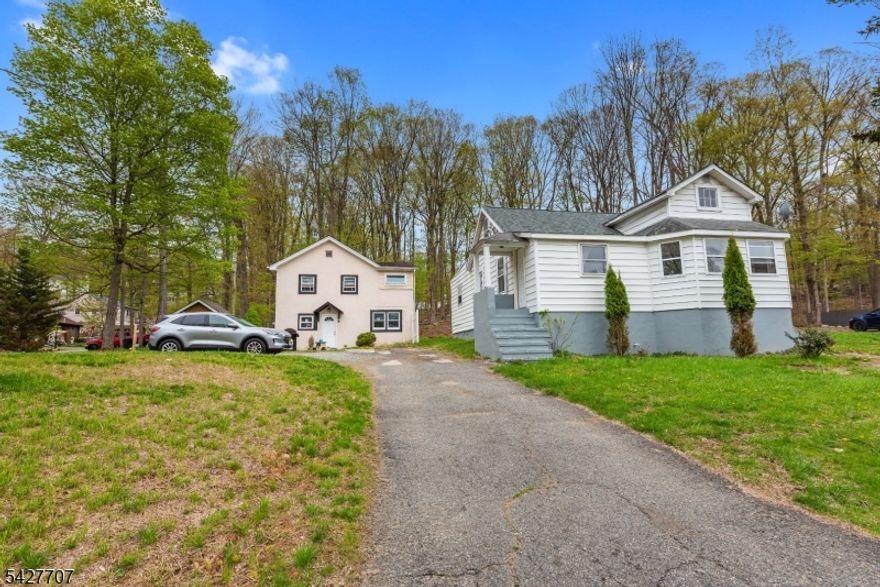 2 Houses on 1 lot!! First is a 3 Bdrm Ranch, Formal  D/R, Lg L/R w wood burning FP, EIK, Walk up Attic, Full unf WO Bsmt, Deck and Fire Pit, new 200 AMP electric service, newer septic.2nd House is a 2 Bdrm Colonial, EIK, L/R, Shed, new 2 bdrm septic. Both have Separate Driveways.