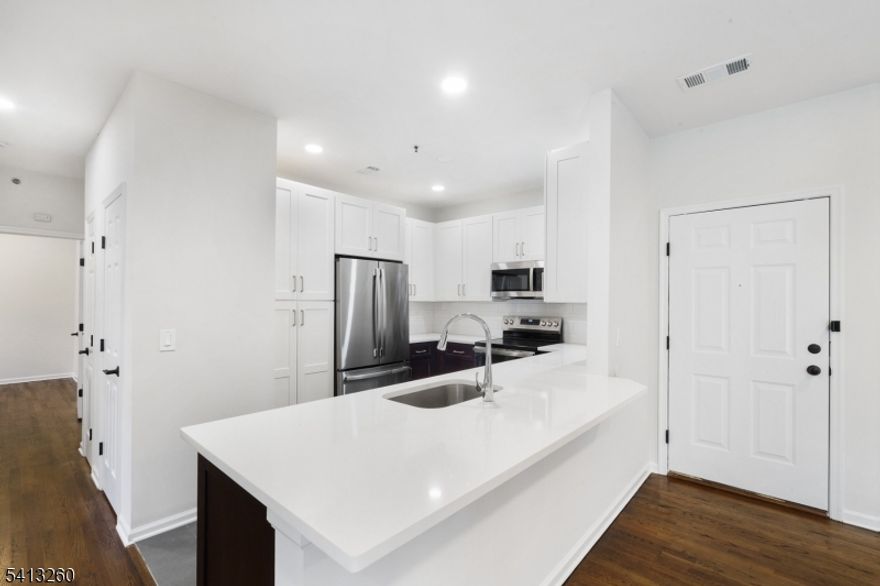 Discover Columbia Court in Springfield, nestled along the foothills of the scenic Watchung Mountains. The Morris floor plan is a 3-Bedroom, 2-Bath upscale apartment that offers the perfect blend of comfort and convenience.  This apartment features modern finishes, designer kitchen with stainless steel appliances and quartz countertops, hardwood floors, 9' ceilings and a spacious balcony.  Enjoy top-tier amenities, including a fully equipped fitness room and convenient parking. Surrounded by a picturesque suburban setting, Columbia Court is ideally located with a short distance to shops, restaurants, and the Millburn Train Station.  I-78 and the Garden State Parkway also make commuting a breeze. Experience the lifestyle you deserve!