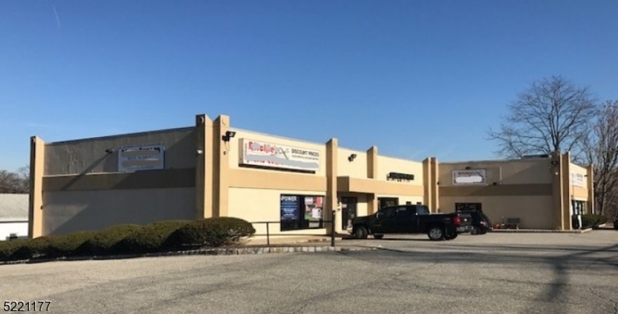 75% leased with room for owner/user. Storage space available, Two buildings, totaalling 5 rental spaces and an aout mechanic shop.