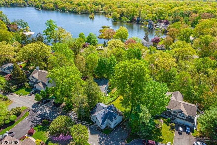 House for rent in the wonderful Cedar Lake Community! 3 Bedrooms, 2 full baths which includes one of each on the main living, no stairs! Home is located on a quiet, cul-de-sac just a short walk to the Lake. Large, functional eat in kitchen with hardwood floors. Lovely and bright living room with sliders to back deck. Upstairs, the other two bedrooms and oversized full bath with glass stall shower. Primary overlooks the backyard with seasonal lake views. Washer and Dryer upstairs for convenience. Licensed, well trained cats and dogs allowed with approval. This home has never been rented before. Well Maintained! Enjoy all the benefits of lake community living. Walking distance beaches (with lifeguards), boating, clubhouse events and playground, ice-skating in the winter. All in desirable Denville, known for an active downtown- events, shopping and restaurants. Close to library, hospital, sports fields, hiking trails & major highways and commuter (bus & train) in NYC Direct. Top Rated Schools.