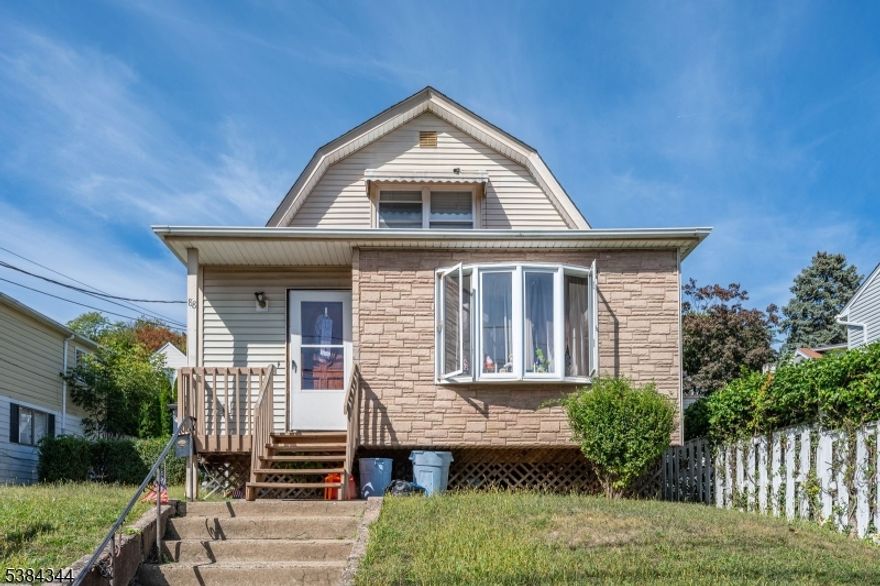 Rare opportunity! Two single-family homes on one lot, perfectly suited for investors or owner-occupants. Nestled in the desirable mountainside section of Haledon, the front home features an eat-in kitchen, living/dining room, 3 bedrooms, 1.5 baths, and a full basement. The rear home offers an eat-in kitchen, living room, dining room, 1 bedroom, 1 bath, and a full basement. This is an estate sale.