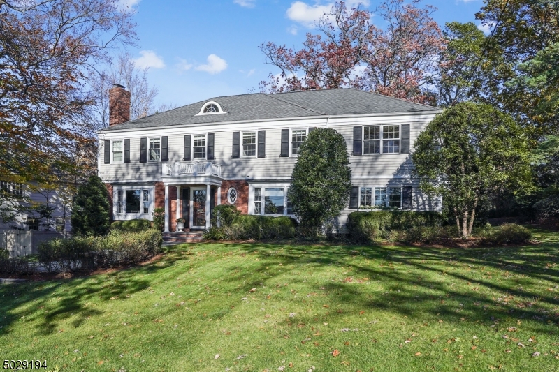 Handsome 5 bedroom, 4.5 bath colonial on spectacular property w/ amazing chef's kitchen, incredible home office w/ custom built ins,  great room & family room. French doors from DR open to stone patio making outdoor entertaining elegant and easy. Chef's kitchen boasts gorgeous center island, Thermador double ovens & 6 burner cooktop, Sub Zero refrig & separate freezer. Backyard is lush escape with mature plantings and cobblestone walkways. Second floor has 5 beds/3 baths. Basement w/rec room, exercise area, storage, full bath &flex space.  Pull down stairs to attic with ton of storage. Stone's throw to Deerfield Elementary/ bus service to Middle/HS. Easy access to Newark Liberty Airport, highways, malls. Millburn/Short Hills offers town pool/ par 3 golf course/ parks/hiking in  the South Mountain Reservation