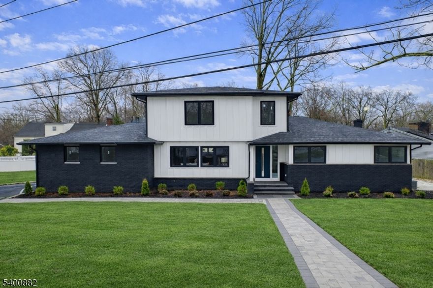 Beautifully Rebuilt & Expanded Ranch in the Milton Lake Section! Step into this stunning modern contemporary ranch, completely rebuilt and expanded to offer exceptional living space. Featuring 4 bedrooms and 3 full baths, this home includes a luxurious first-floor primary suite with a spa-like bath and spacious walk-in closet. You'll love the brand-new chef's kitchen, showcasing Corian countertops, a massive center island, and an oversized pantry perfect for everyday living and entertaining. The open layout flows into a warm and inviting family room with fireplace, plus a separate dining area. A gorgeous entrance foyer leads to a bright and airy living room. Additional highlights include an attached 2-car garage and a picturesque location just moments from beautiful Milton Lake. A rare opportunity to own a thoughtfully designed, move-in-ready home in an exceptional setting.