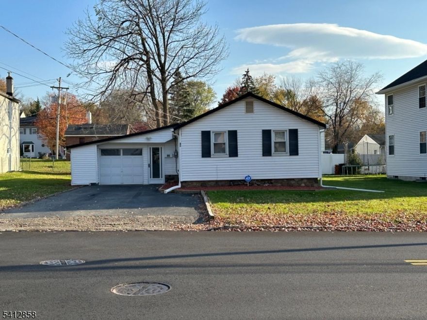 Freshly painted, new flooring in this ranch style 3 Bed 1 Bath House on an oversized lot in the desired neighborhood of Lake Parsippany. Walking distance to Lake Parsippany. Walking distance to elementary school and close to shopping and transportation. Very well connected to Rt. 287, Rt. 80, Rt. 280, Rt. 10 and Rt. 46. Excellent connectivity to New York City with multiple park and ride and train stations nearby. Furnishings include Queen bedroom set in one bedroom. Second bedroom is currently being used as an office and has office furniture. New Refrigerator, new wall oven and movable island in the kitchen. Dining room includes dining table with 6 chairs. Living area includes sofa, loveseat, center table and fireplace. Large backyard with a yard shed and an oversized deck for your outdoor gatherings. One car attached garage with workbench.