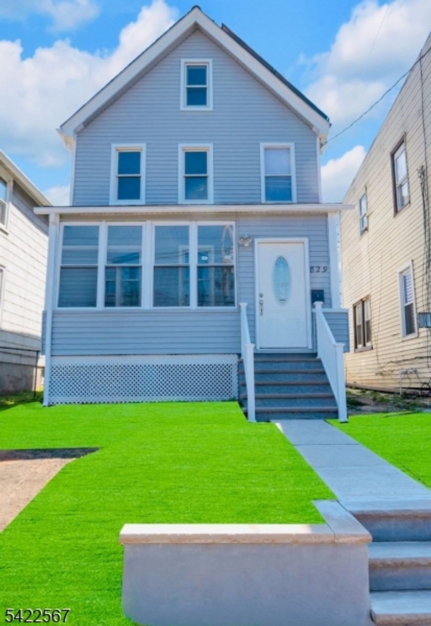 Now $469,000! Impeccably Remodeled 3-Bed Colonial! Welcome to this beautifully renovated Plainfield gem, freshly repositioned to attract today's prospective buyers. This stunning 3-bedroom, 1.5-bath Colonial has been thoughtfully updated from top to bottom while maintaining its classic charm. The inviting enclosed front porch leads into a bright, airy living room featuring a stylish pass-through window into the spacious eat-in kitchen perfect for entertaining. The kitchen is finished with warm oak cabinetry, crisp subway tile backsplash, quartz countertops, stainless steel appliances, pendant lighting, and a large pantry. Upstairs you'll find two generously sized bedrooms with abundant natural light and an updated full bath with a glass-enclosed shower. The third-floor bedroom offers vaulted ceilings and great versatility. Outdoor living shines with an enclosed year-round porch, expansive rear deck, and fully fenced backyard. The full basement provides excellent storage and laundry. Bonus: fully owned solar panels for energy savings! Located on a quiet street and move-in ready schedule your showing today!