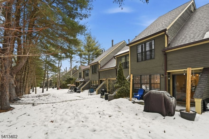 Lovingly maintained 2 BR townhome with  NO  steps from walkway to frt dr opening to a welcoming spacious foyer, hallway and on into the open flr plan  Kit/DR/LR! Enjoy the fabulous living area with views to a private patio overlooking trees and level lawn area. The well appointed open kit w SS appliances, quartz ctrs and newer cabinets allows for a eating area plus the adjacent formal DR. The entire main level offers new luxury vinyl plank flooring which continues up into the 2nd level hallway and BR's.for a seamless flow throughout! The updated pdr rm, dble coat closet and pantry complete the main level. 2nd level offers a primary with lrg WIC and built ins! The inviting main bth offers a 48 in vanity, tiled flr and wainscotting along w tub/shr combo. A secondary BR w dbl closet and built ins, laundry/utility rm plus a lrg linen closet complete the bedroom level. Lrg attic w pull down stairs offers great storage! Bald Eagle Village offers the convenience of close proximity to town center amenities and main road commute nestled into the foothills of West Milford. Nature enthusiasts will enjoy the walking paths and hiking trails. Bsktball and tennis for the sports enthusiast and a clubhouse for social events. The surrounding area offers everything from an array of eateries, modern grocery stores along with all the standard amenities close to home. Quaint villages, markets, orchards, wineries, breweries, golf, Mtn Creek, Minerals and Crystal Springs, State Prks, NYC, airports.