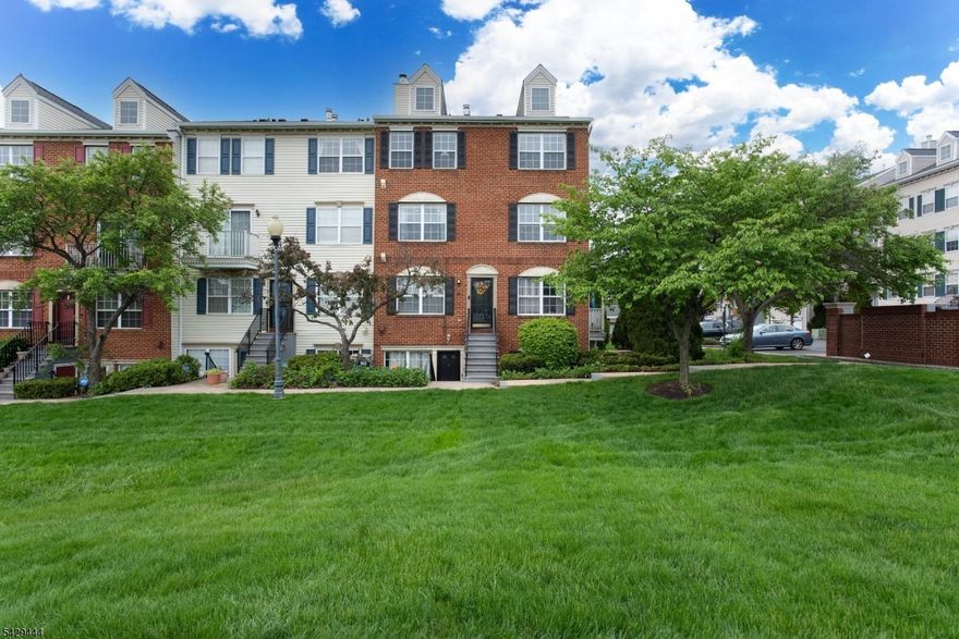 Welcome home to 89 Vaughan Drive! A well maintained corner townhome unit with 3 bedrooms, and 2 bathrooms located in the Society Hill community. The main level consists of hardwood floors in the living and dining areas. The kitchen consists of granite countertops and a wonderful island to sit at while having your morning coffee. There is also a balcony to sit outside and enjoy the day. This level also has a half bathroom. The second level features 3 generously sized bedrooms with one full bathroom. The washer and dryer is conveniently located on this level for easy access. The unit includes central HVAC heating and cooling. There is one assigned parking spot with ample visitor spots. The community amenities include a pool, tennis courts, clubhouse, playground, and 24-hour security patrol. Location, location, location! It is 10 minutes from Newark Liberty International Airport, 20 minutes from NYC, minutes from NJPAC, NJ IT, University Hospital, and easy access to major transit.