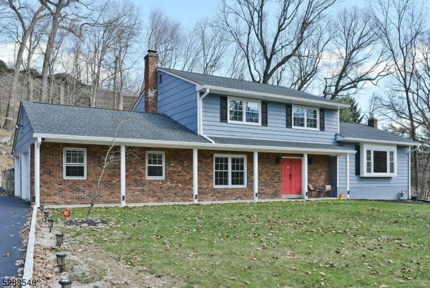 Welcome to your dream home! This charming home boasts four spacious bedrooms, perfect for accommodating guests. With two and a half baths, mornings are a breeze, ensuring everyone gets ready with ease. The gleaming hardwood floors throughout add warmth and elegance to every room, while the newly updated kitchen is a chef's delight, equipped with modern appliances and ample storage space. Retreat to the large master bedroom complete with its own luxurious bathroom, offering a sanctuary after a long day. The finished basement provides additional living space, ideal for a home office, gym, or entertainment area. Natural light floods the home, creating a bright and inviting atmosphere. Enjoy peace of mind with a brand new roof and driveway, along with the comfort of central air conditioning. Conveniently located near major highways, commuting is a breeze. Embrace the epitome of comfort and style in this immaculate home!