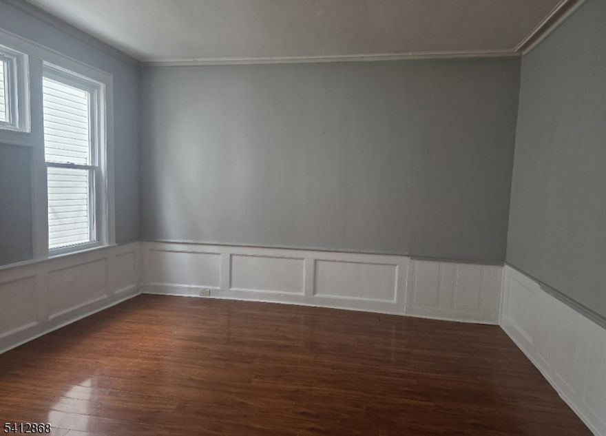 Welcome to your next spacious rental home a 4-bedroom, 1-bath multi-family gem nestled in a vibrant Newark neighborhood. This residence offers room to grow, work, relax, and maybe even dance around on a cleaning day (no judgment here). Each bedroom is generously sized, with the primary bedroom offering a cozy retreat at the end of a long day.Step outside and you'll find yourself surrounded by everyday conveniences. Need to grab groceries? Extra Supper Market of Newark and Supremo Food Market of Irvington is right around the corner. Public transportation's a breeze with the public bus line right outside of your door and Irvington Bus Terminal and local train stations nearby, making your commute into downtown Newark or even further a smooth ride. You will appreciate the close proximity to Weequahic High School, and for a breath of fresh air or afternoon stroll, Saint Peters Park is just a few steps away. And if you've got a travel bug or friends flying in, Newark Liberty International Airport is only a short drive away close enough for convenience, but far enough that you won't hear every takeoff.The neighborhood is an energetic mix of culture, community, and character. Whether you're running errands, exploring local eateries, or heading downtown for a weekend adventure, you're in the right spot.