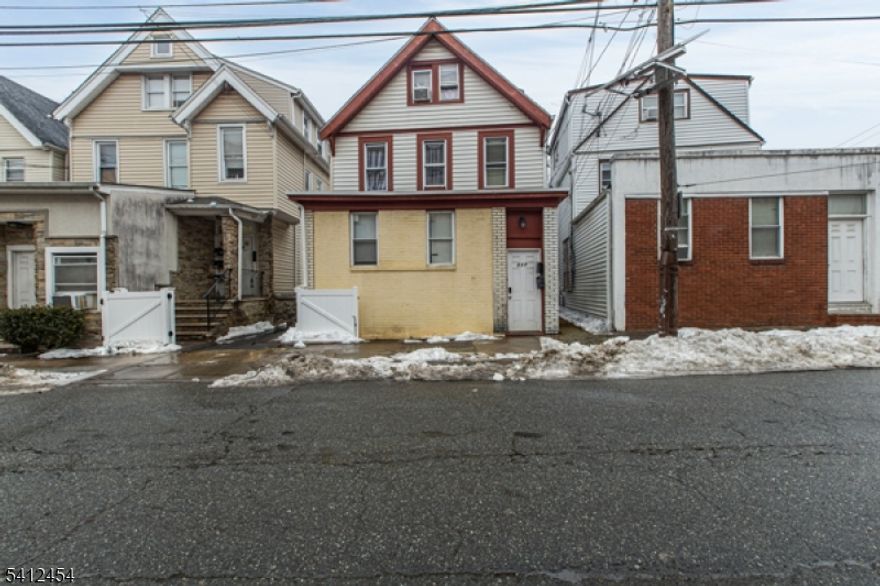 Spacious two-family home offering excellent opportunity for owner-occupants or investors! First unit features 3 bedrooms, 1 full bath, and a versatile den area, and will be delivered vacant at closing. Second unit offers 5 bedrooms with additional attached attic space, currently tenant occupied providing immediate rental income. Ideal setup to live in one unit while collecting rent from the other. Conveniently located near major highways, public transportation, shopping, and schools.