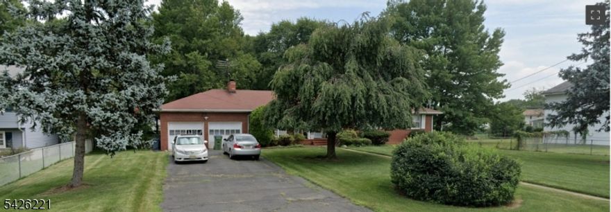 Welcome to this four-sided brick Sprawling Ranch in one of North Edison's most desirable neighborhoods, offering vast space, solid construction, and rare subdivision potential with site plans available and underway.  Double front doors open to a formal living room with hardwood floors beneath the carpet and a dedicated dining room. Kitchen features sliding doors to a wood deck, while a separate laundry room offers additional deck access, closet space, and a powder room.  The spacious family room showcases wood flooring, two bright windows, and a wood-burning fireplace with a full brick surround. Four bedrooms all feature hardwood flooring, including an oversized primary suite with a full en-suite bath. An additional full bath, foyer, and linen closet complete the layout.  Most major systems have already been addressed, including roof, furnace, water heater, and leaf-filter gutters approximately seven years old, plus a French drain and sump pump already in place.  Situated in highly sought-after North Edison with convenient access to major commuting routes, shopping, dining, and top-rated amenities, this property offers both immediate comfort and long-term investment potential. With sprawling land and subdivision possibilities, this is a rare opportunity you don't want to miss.  A true North Edison stunner worth pursuing!  Confirm your private tour, today.