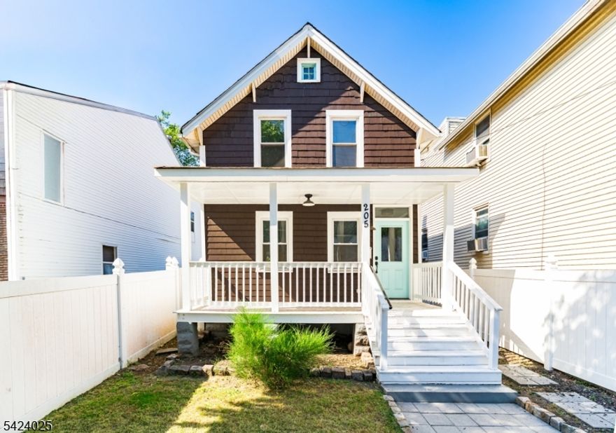 Stylish and move-in ready, this beautifully updated 2-bedroom, 2-bath single-family home blends modern design with timeless charm. The open-concept layout features wide-plank hardwood floors, an exposed brick accent wall, and a bright chef?s kitchen with quartz countertops, subway-tile backsplash, stainless-steel appliances, and peninsula seating. Both full baths showcase marble-style tile and matte-black fixtures for a clean, elevated finish.Enjoy forced hot air and central A/C for year-round comfort, a large clean basement perfect for storage or recreation, and peace of mind with updated major systems, roof, and windows. A covered front porch and private fenced backyard with paver patio offer ideal spaces for outdoor living and entertaining.Conveniently located near parks, NJ Transit, and major highways?just minutes from downtown Orange and the direct NYC train line at Highland Ave Station. Move right in and enjoy modern comfort in a charming neighborhood!